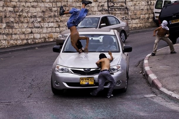 Israeli settler runs over little Palestinian boy